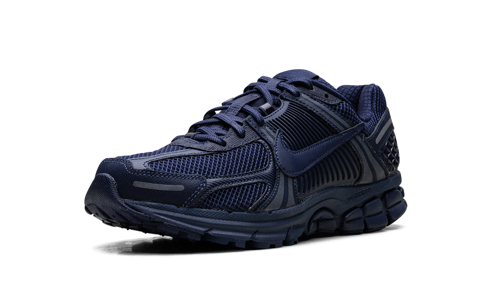 Zoom Vomero 5 "Midnight Navy" running on an outdoor track shoes