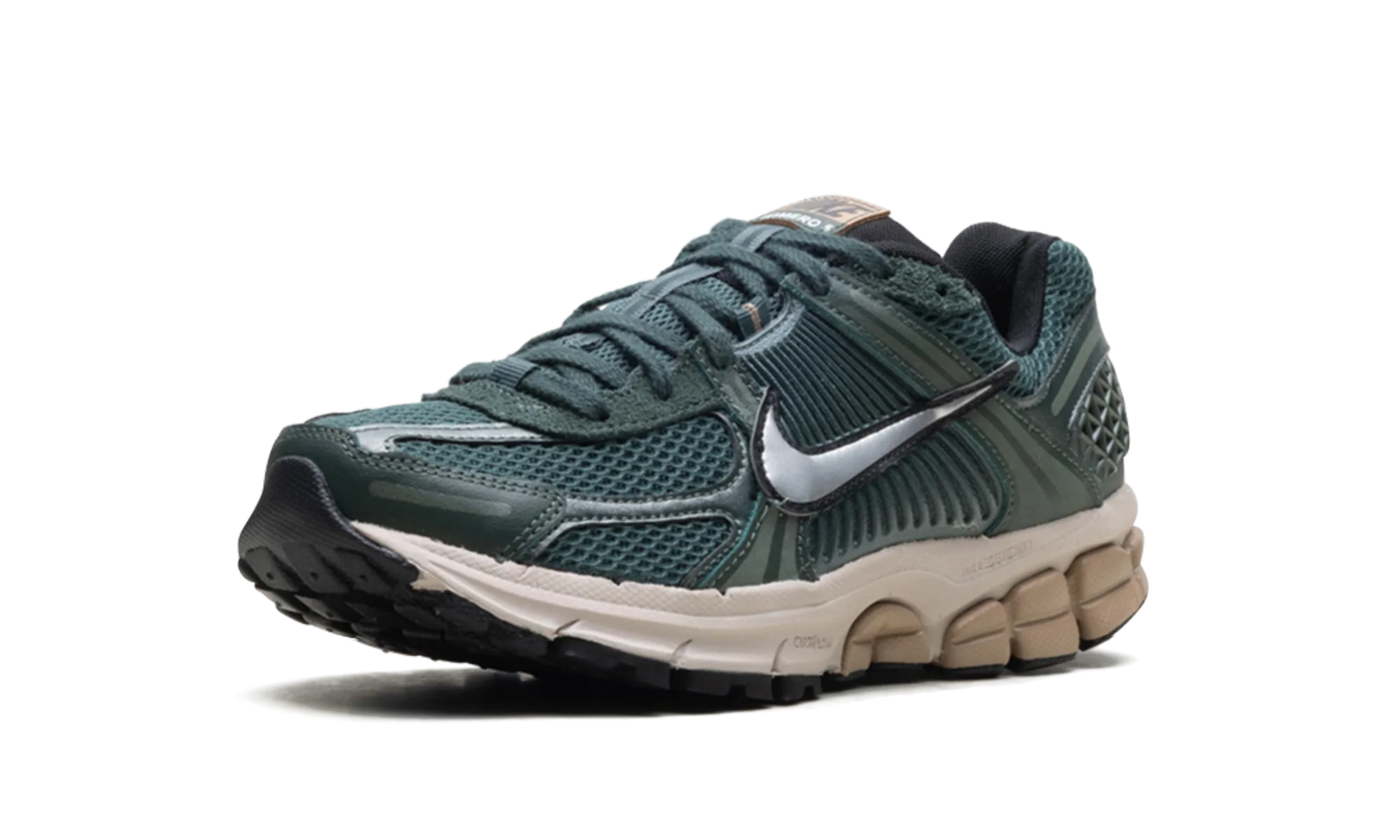 running in a lava field area shoes Air Zoom Vomero 5 WMNS "Vintage Green"