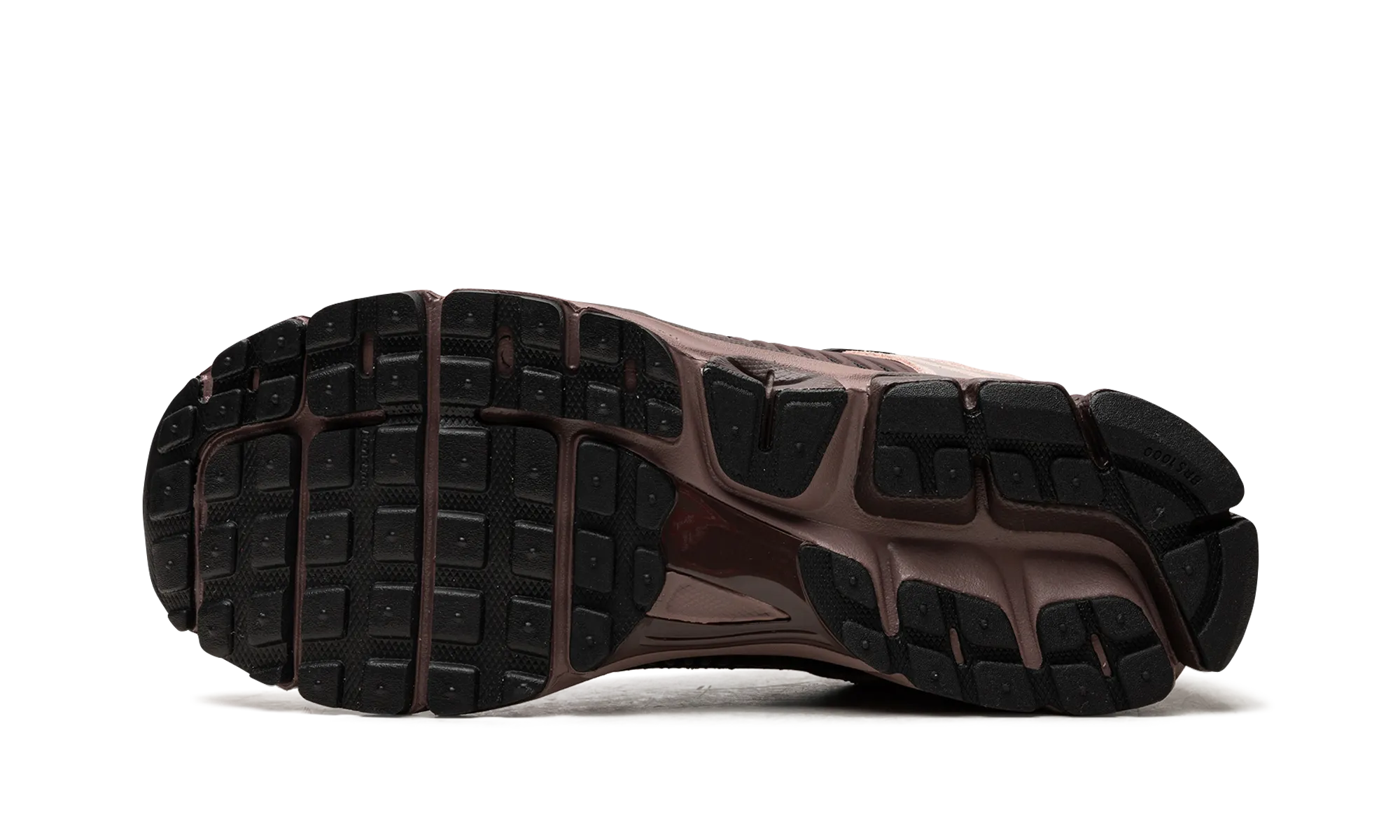 ZOOM VOMERO 5 WMNS "Plum Eclipse" running in a monorail station area shoes