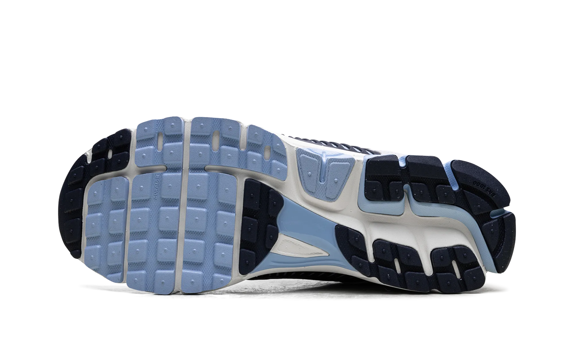 running in a monorail station area shoes Dark color Zoom Vomero 5 "Psychic Blue"