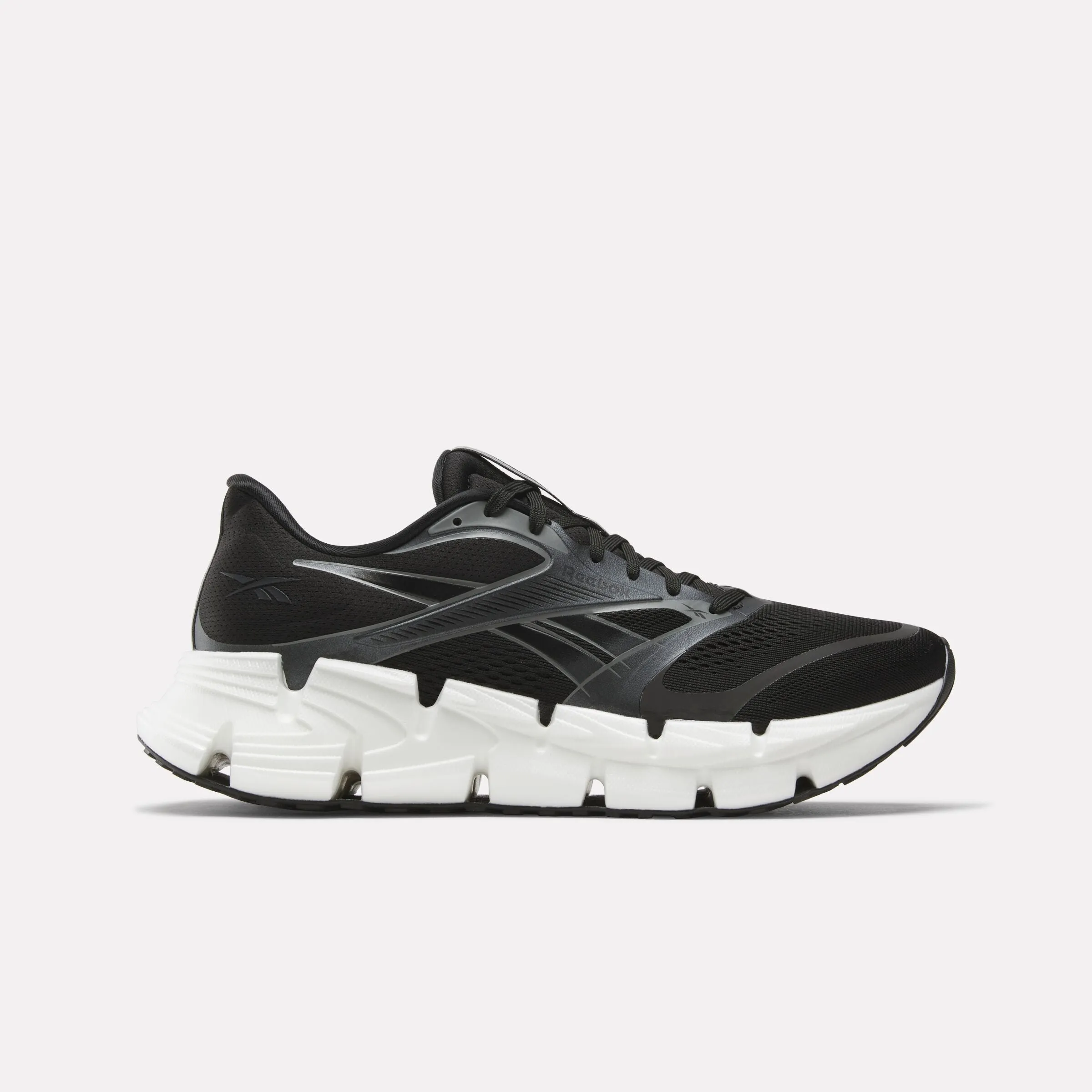 Men's FloatZig 2 Running Shoes running with a gum rubber outsole park accessory