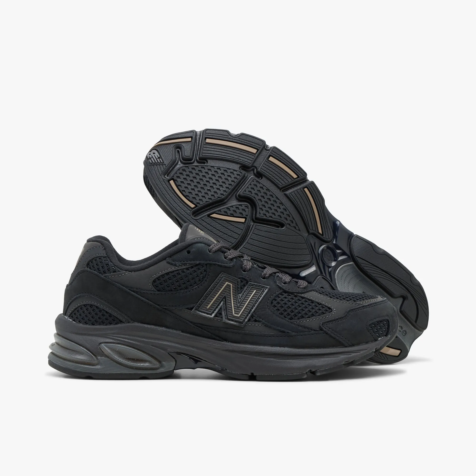 New Balance 2010 Black / Black Cement Boosted sole