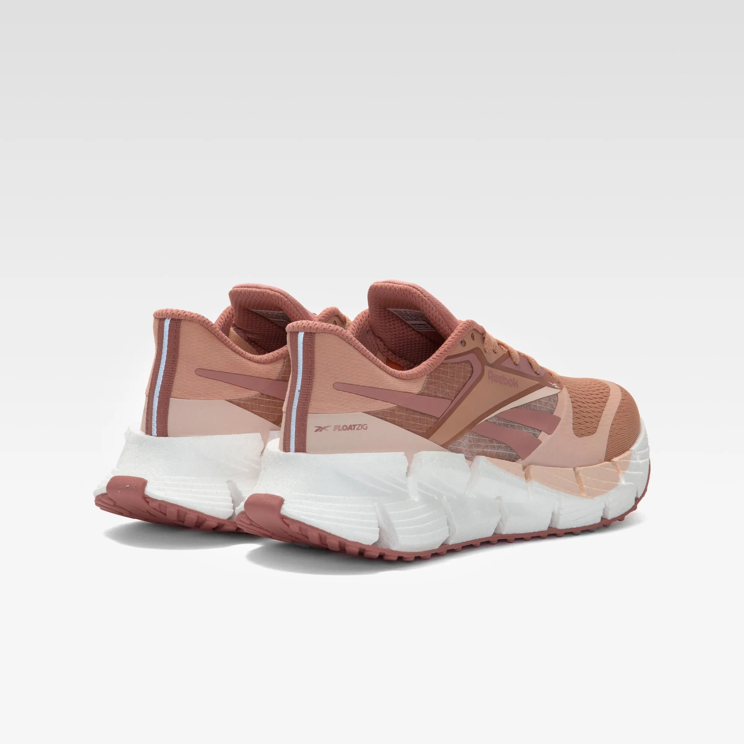 Reebok Footwear Women FloatZig 1 Shoes CLAY/PINK CLAY/WASHED CLAY running in a forest Winter running protection