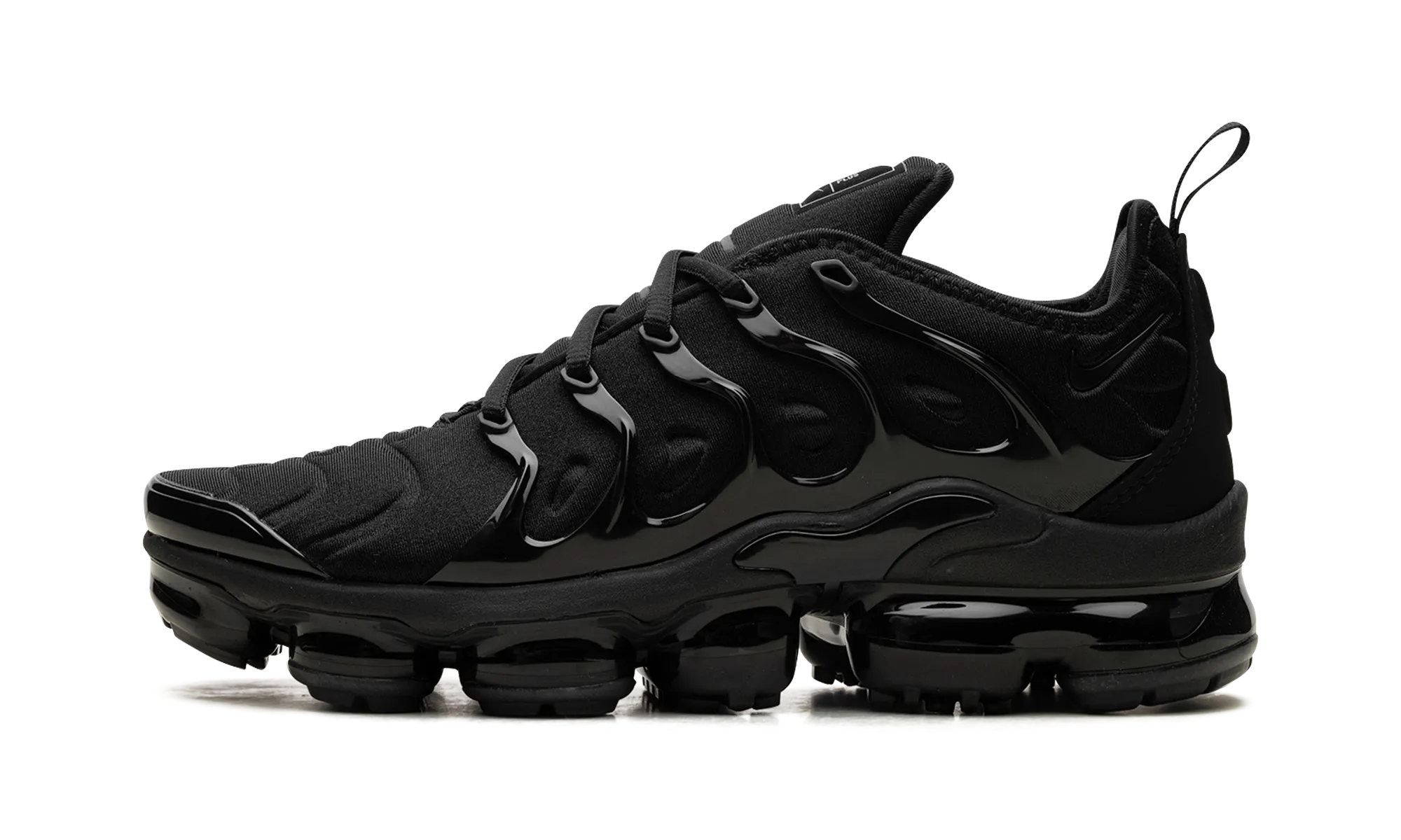 Air Vapormax Plus "Triple Black" running in a truss bridge area shoes