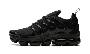 Air Vapormax Plus "Triple Black" running in a truss bridge area shoes