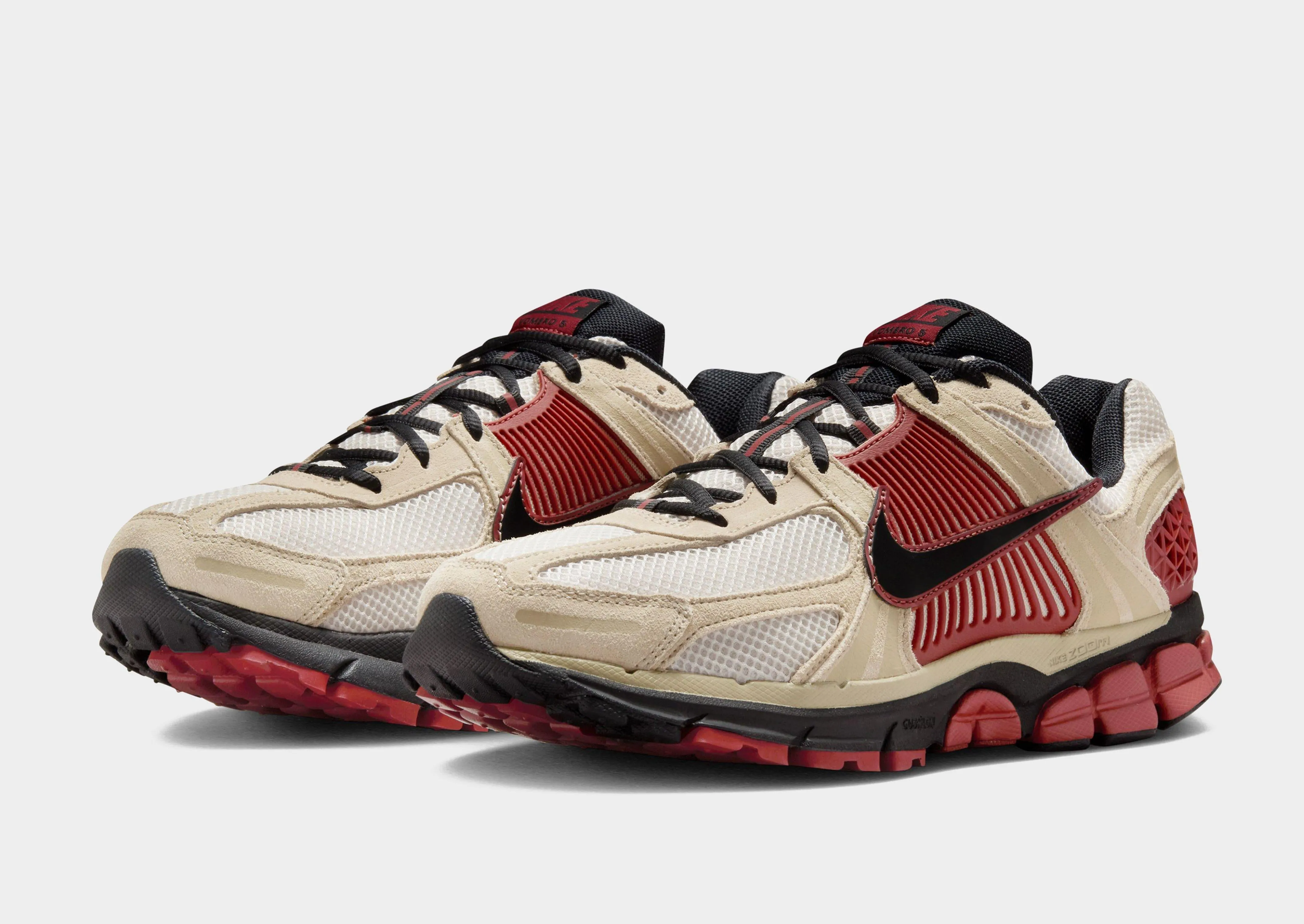 Zoom Vomero 5 running in banked tracks shoes