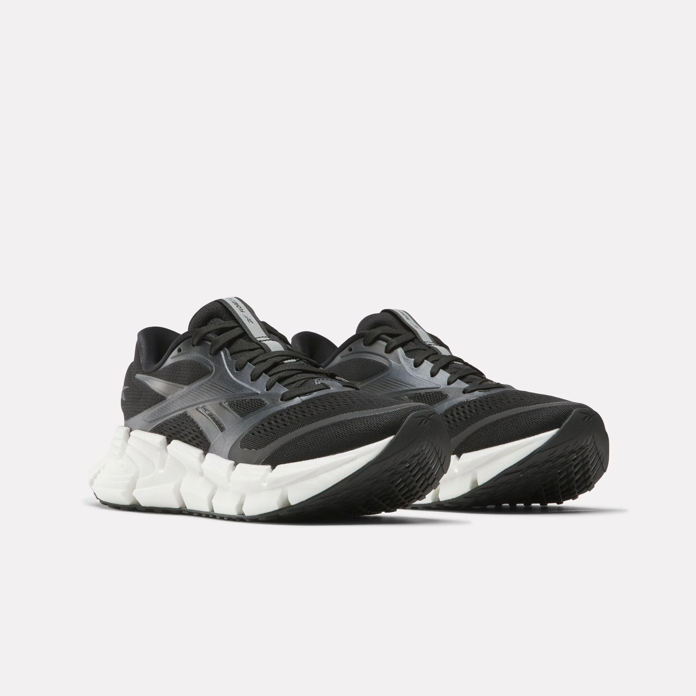 running in a softball field area shoes slim fit Reebok Footwear Women FloatZig 2 Running Shoes BLACK/WHITE