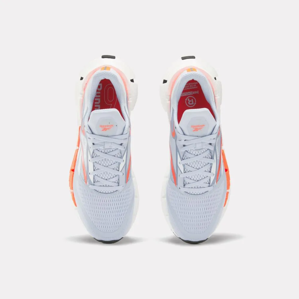 Reebok Footwear Men FloatZig 1 Shoes PALBLU/FTWWHT/ORGFLA yoga practitioners' shoes vertical - design shoes