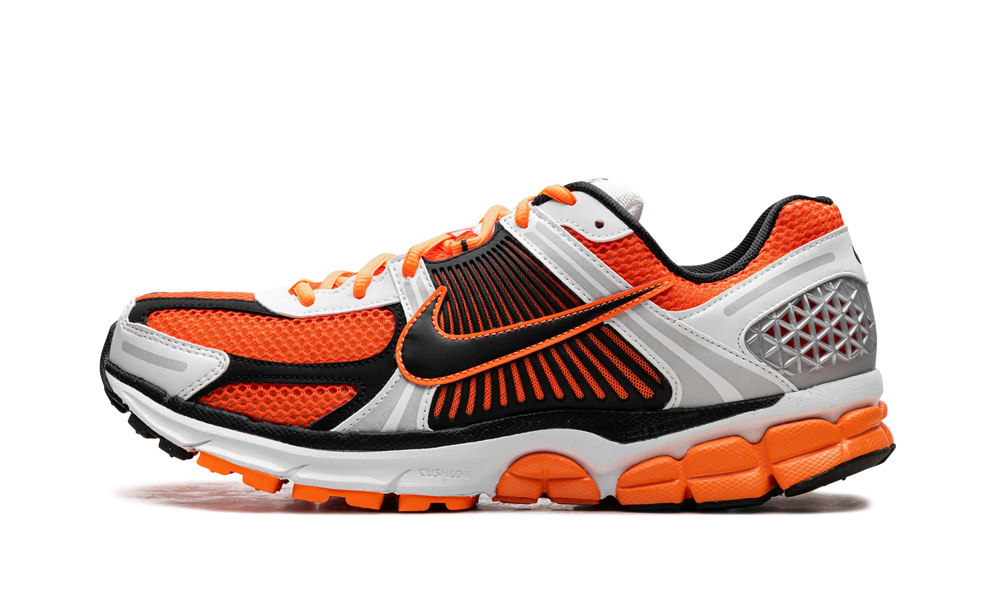 Zoom Vomero 5 "Total Orange" running in a concrete bridge area shoes StretchMesh