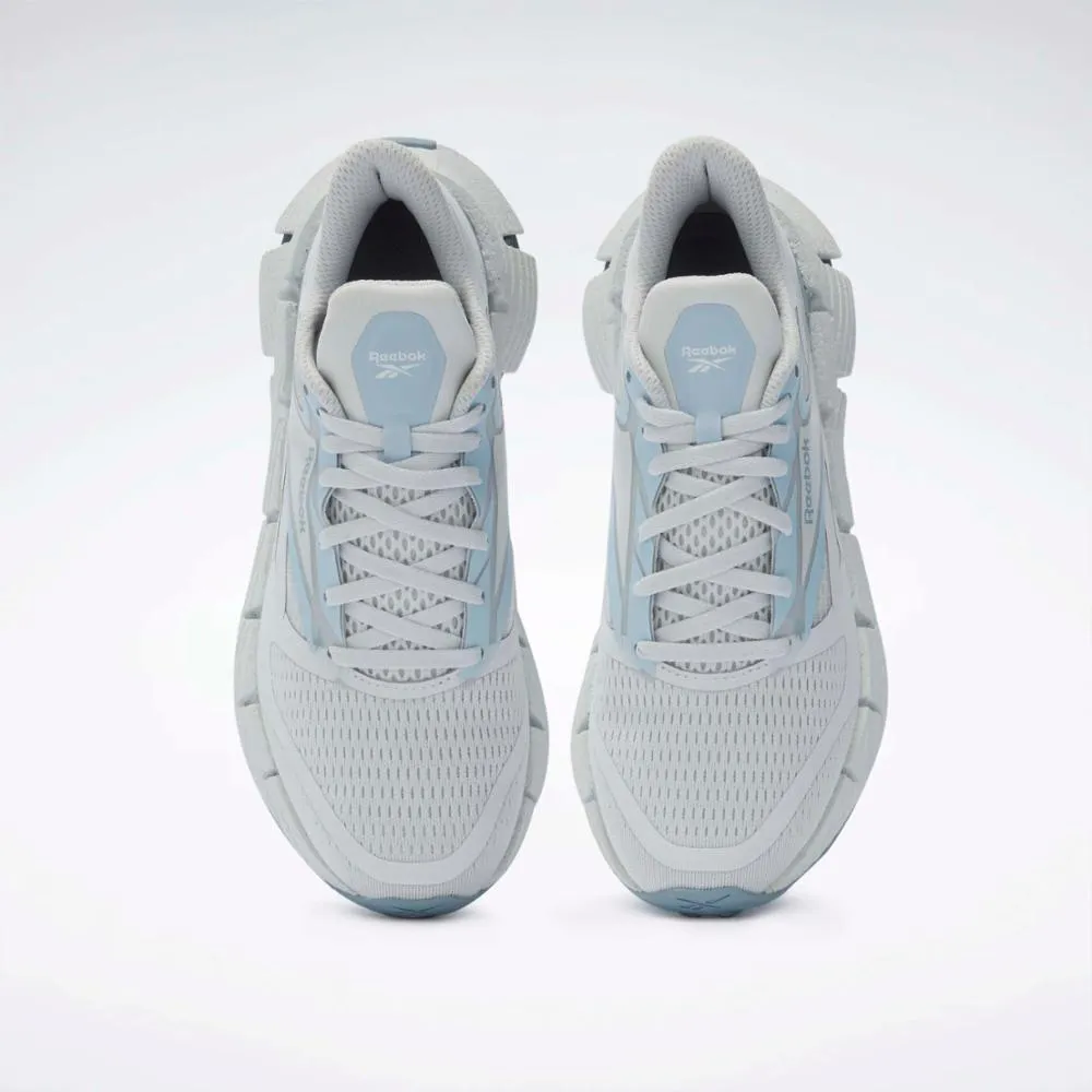 cross - country - specific shoes running shoes with traction pattern Reebok Footwear Women FloatZig 1 Shoes MOON/Y2K BLUE/MOON