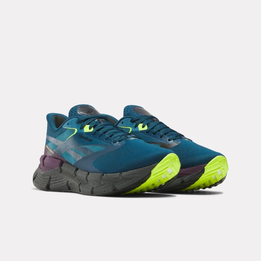 running shoes with gel cushioning Reebok Footwear Men FloatZig Symmetros Running Shoes ESCP BLUE/GREY 6/MIDNIGHT PLUM