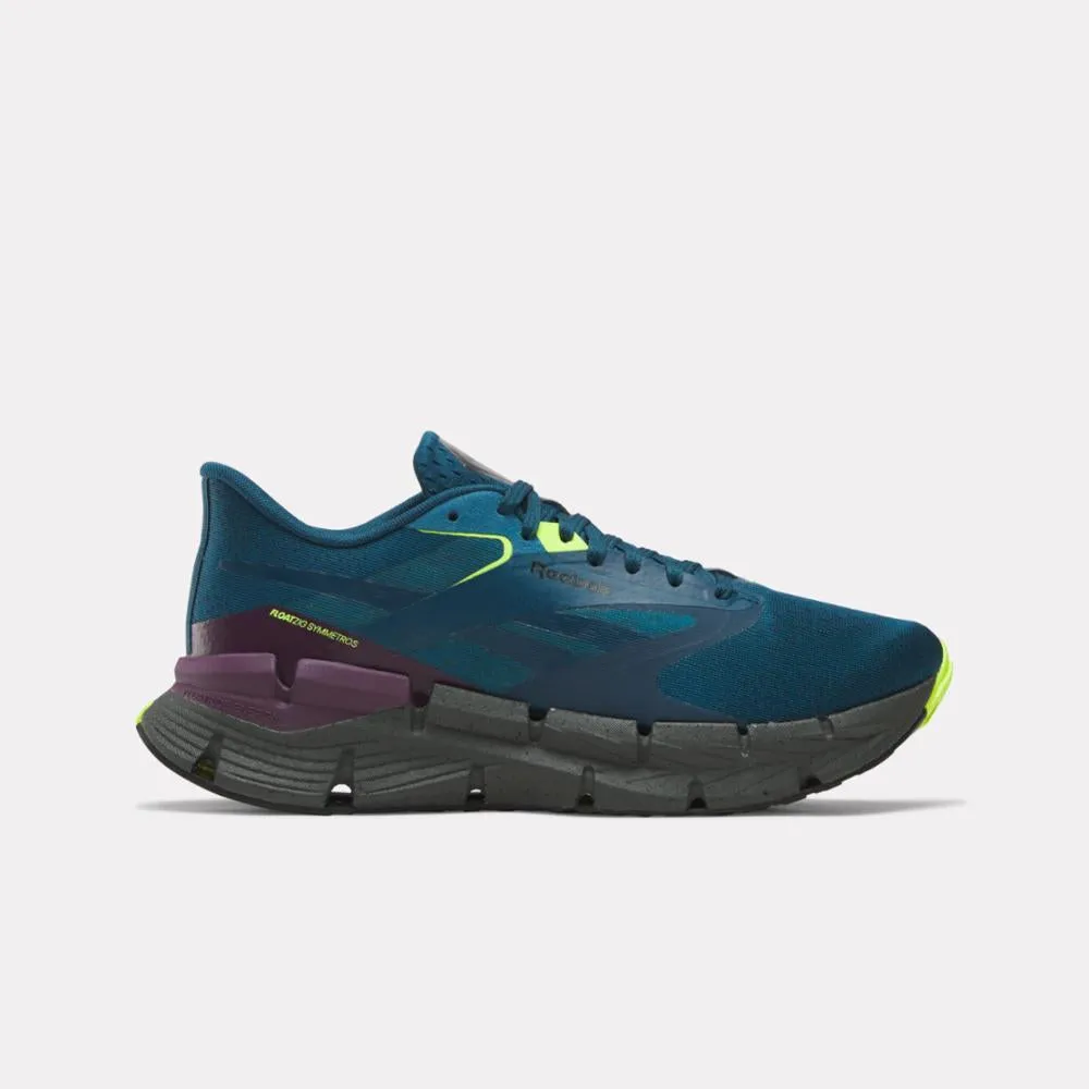 running in a arch bridge area shoes Reebok Footwear Men FloatZig Symmetros Running Shoes ESCP BLUE/GREY 6/MIDNIGHT PLUM