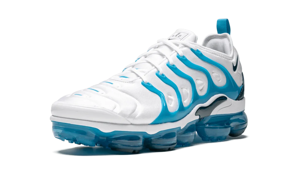 Air Vapormax Plus running in a concrete bridge area shoes